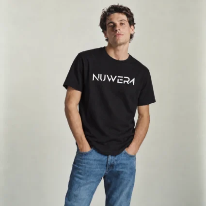 Model wearing the black Nuwera tee with the white NUWERA wordmark